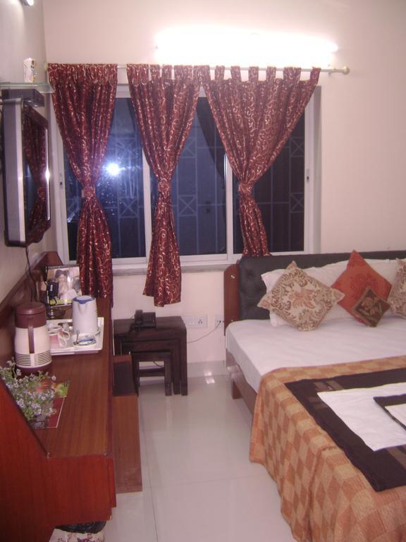 Innra Guest House Калькутта Номер фото